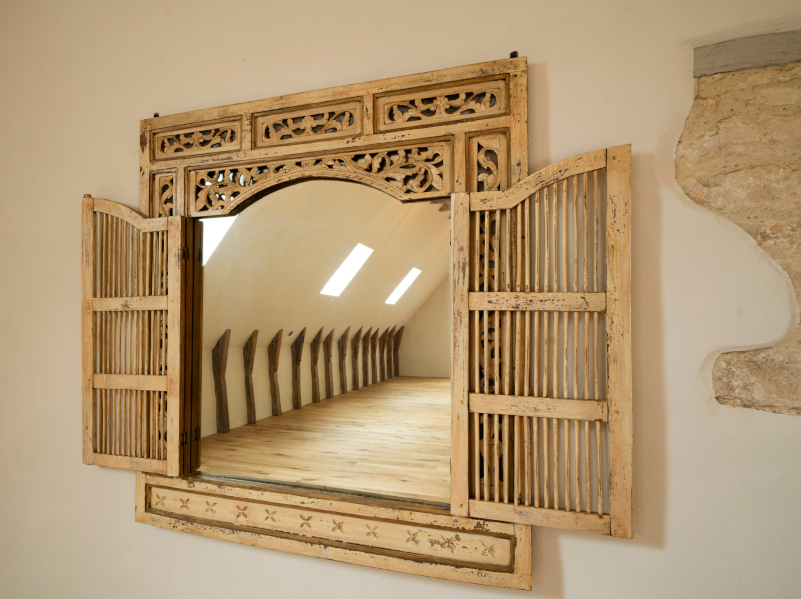 the Ark reflected in an arched mirror.