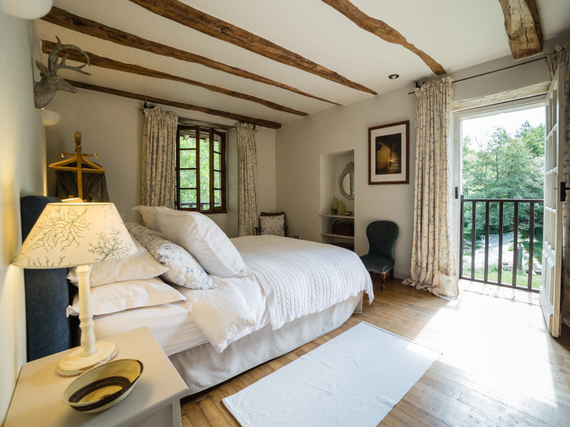 A delightful bedroom overlooking the weir